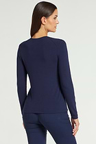 The Best Travel Top. Woman Showing the Back Profile of a Tony Pima Cotton Long-Sleeve Top in Navy