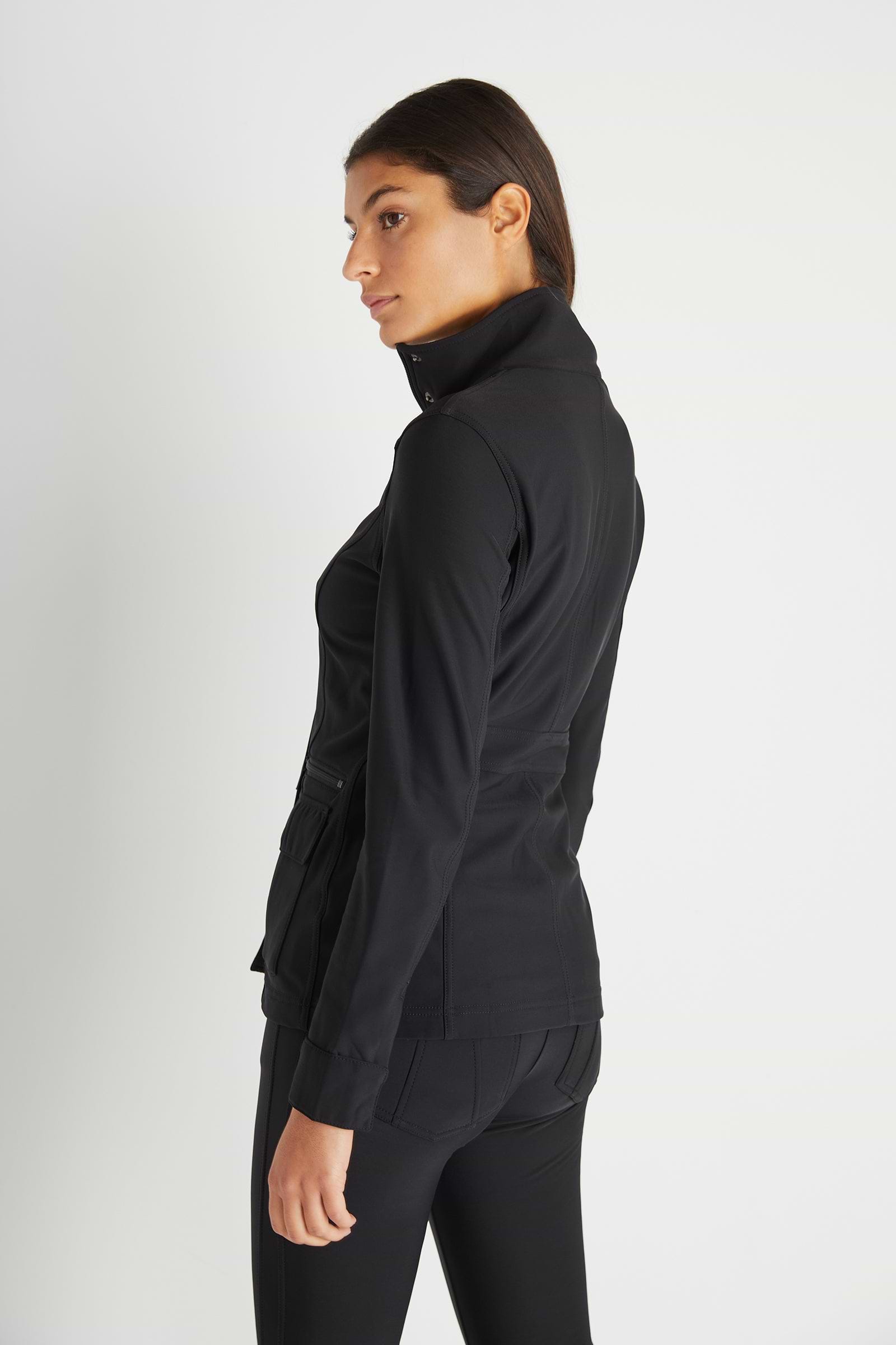 The Best Travel Fleece-Lined Jacket. Woman Showing the Side Profile of a Kenya Cozy Fleece-Lined Jacket in Black