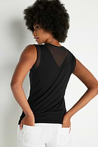 The Best Travel Tank Top. Woman Showing the Back Profile of a Flo Pima Cotton Tank in Black