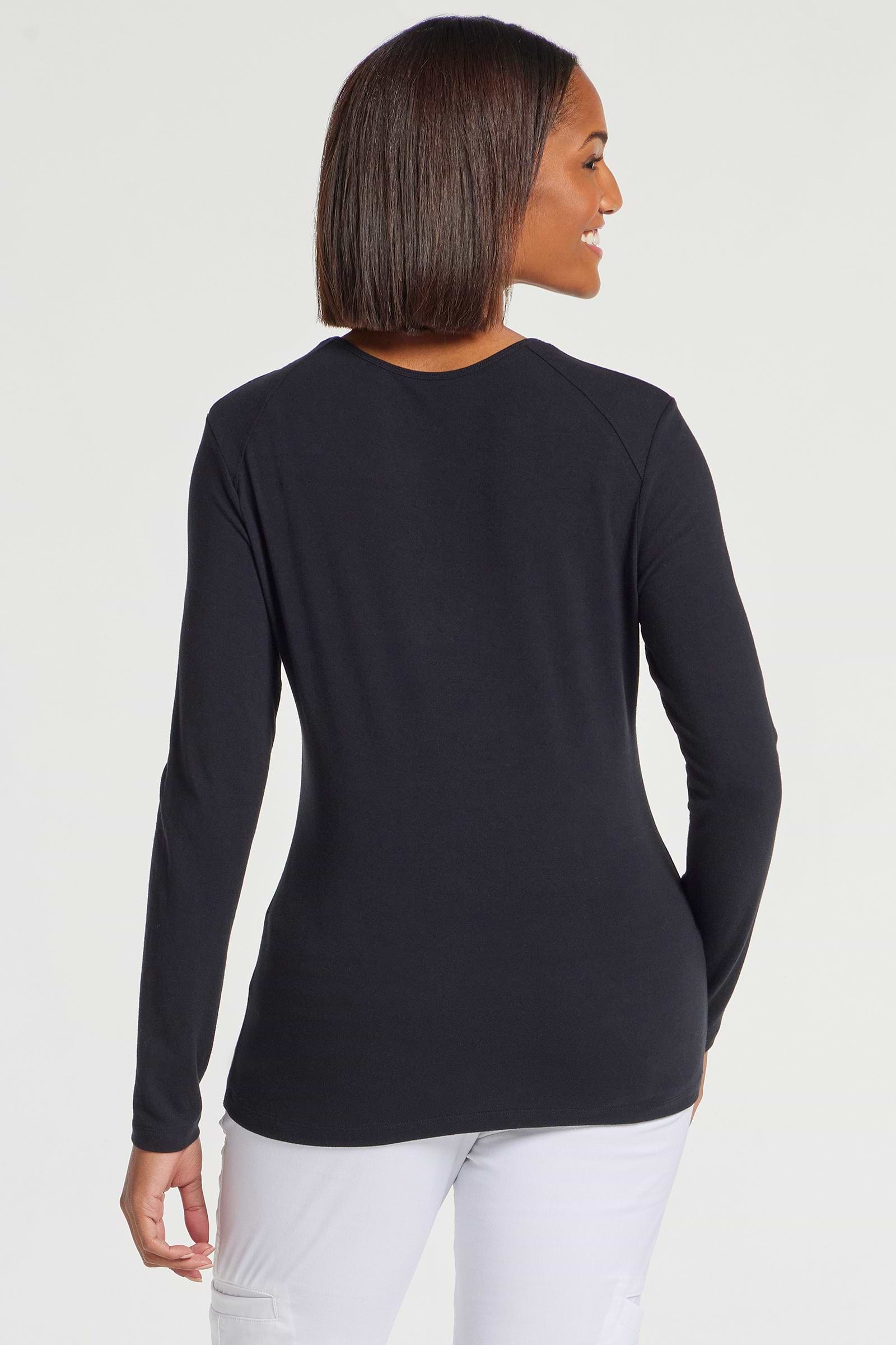 The Best Travel Top. Woman Showing the Back Profile of a Tony Pima Cotton Long-Sleeve Top in Black