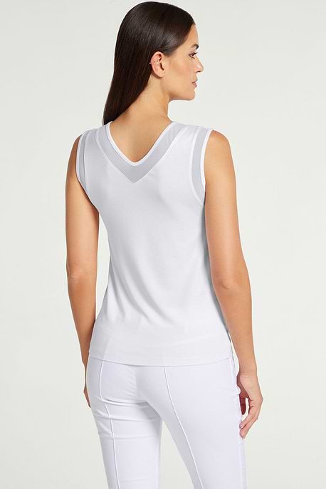 The Best Travel Tank Top. Woman Showing the Back Profile of a Jackson Pima Tank in White.