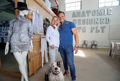 Kate, Shawn, and Luna Boyer stand for a family picture