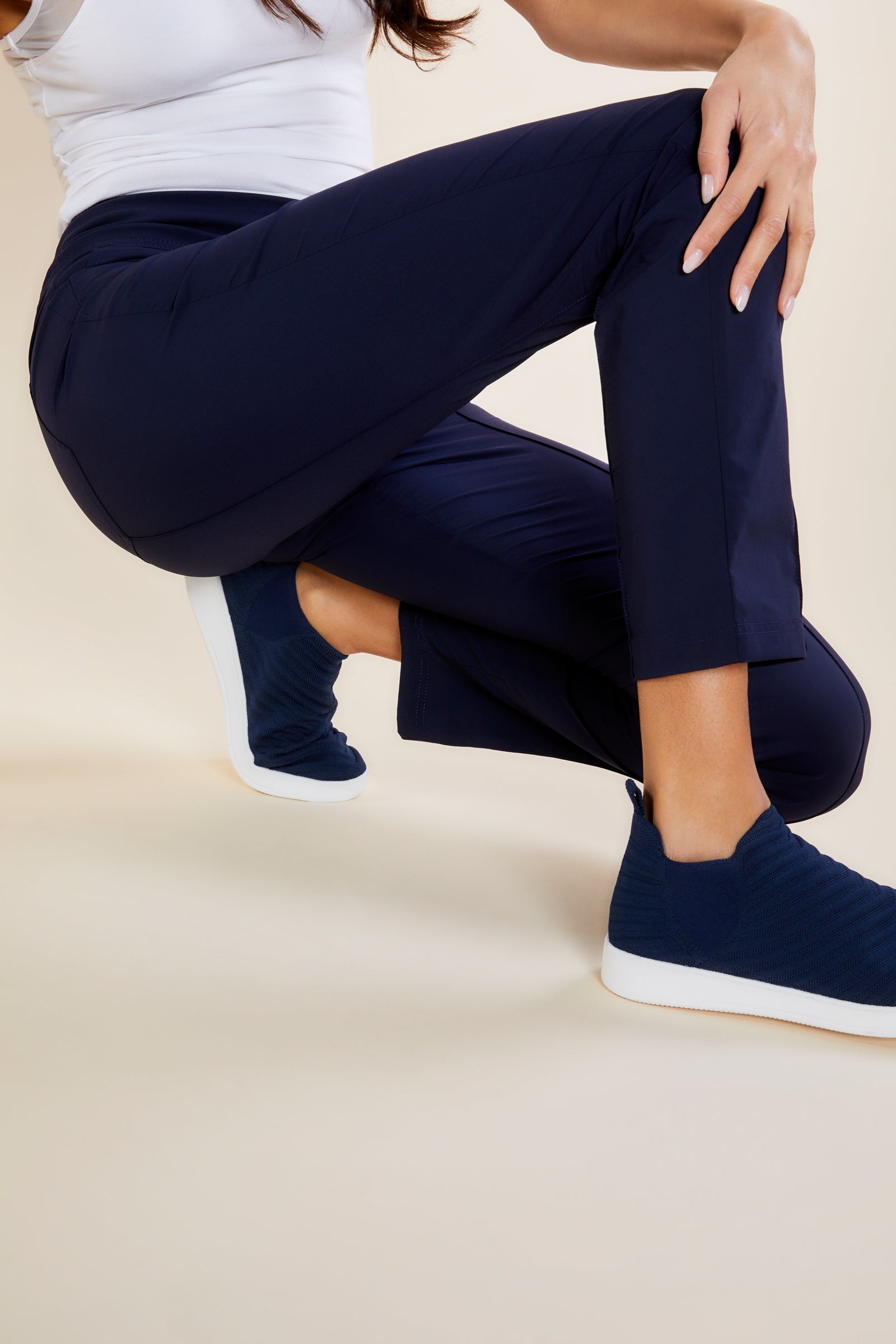 The Best Travel Pants. Side Profile of the Sonia Curvy High Rise Pant in Navy