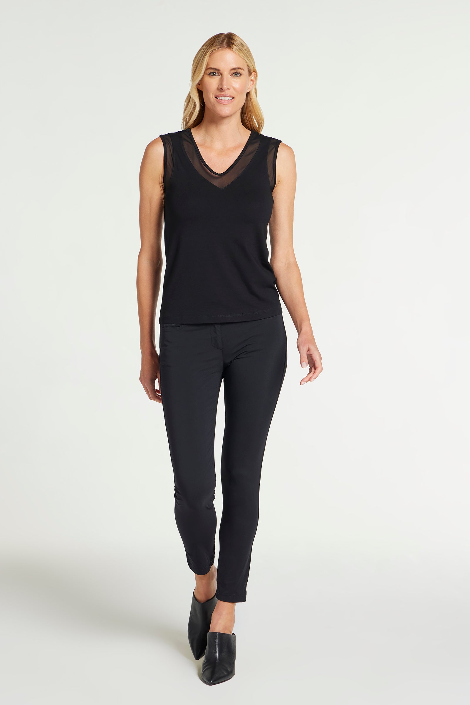 The Best Travel Tank Top. Woman Showing the Front Profile of a Jackson Pima Tank in Black.