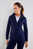 The Best Travel Safari Jacket. Woman Showing the Side Profile of a Safari Jacket in Navy ||