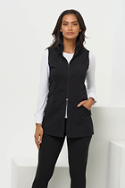 The Best Travel Vest. Woman Showing the Side Profile of a Delaney Travel Vest in Black.