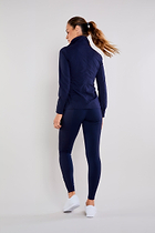 The Best Travel Pants. Woman Showing the Black Profile of the Allie Pant in Navy