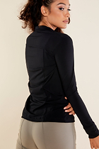 The Best Travel Top. Woman Showing the Back Profile of a Danica Snap On Super Jersey Top in Black