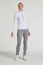 The Best Travel Top. Woman Showing the Front Profile of a Stacey Top in White.