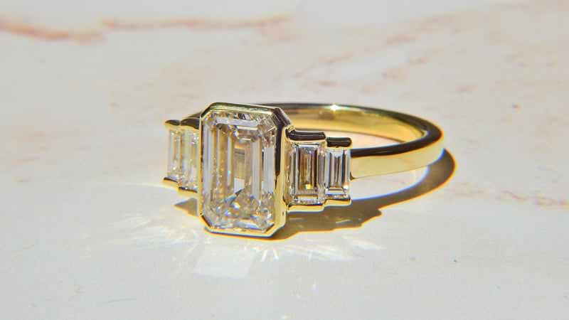 Emerald Cut Yellow Gold 5 Stone Bezel Engagement Ring