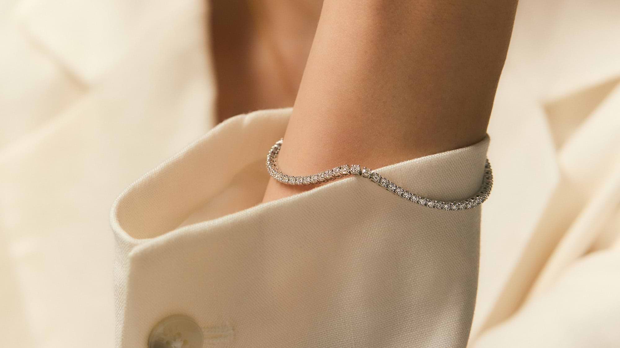 Lab created diamond tennis bracelet on wrist