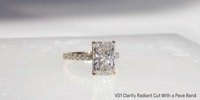 VS1 Clarity Radiant Cut Diamond Ring with a Pave Diamond Band