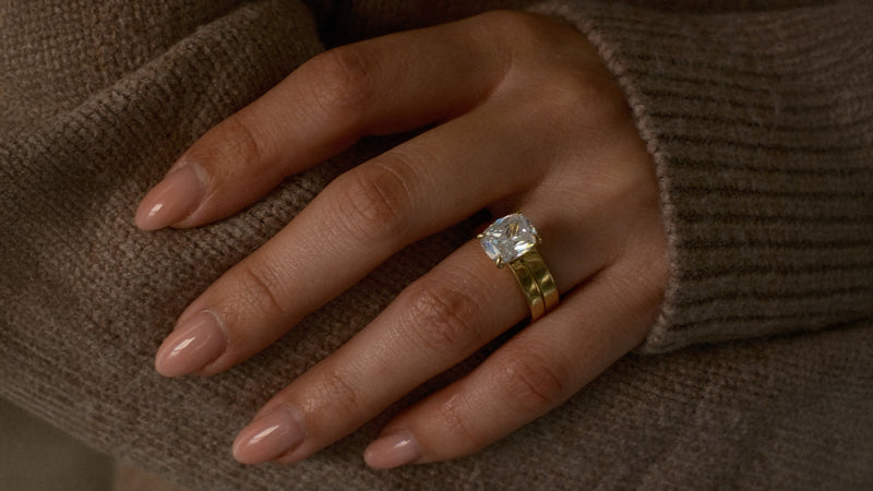 Cushion Cut Wide Engagement Ring With Wide Plain Wedding Band On Hand