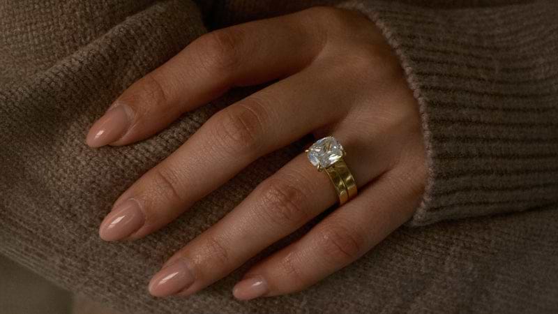 Cushion Cut Wide Engagement Ring With Wide Plain Wedding Band On Hand