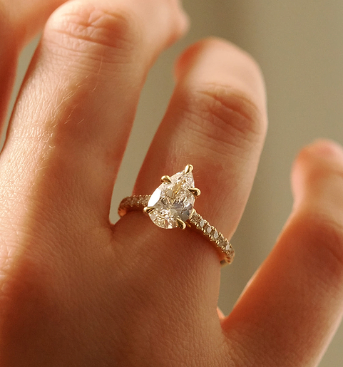 Yellow Gold Pear Cut Pave Cathedral Ring On Hand