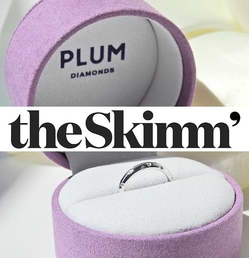 The Skimm' logo bannered over a diamond ring in a rng box
