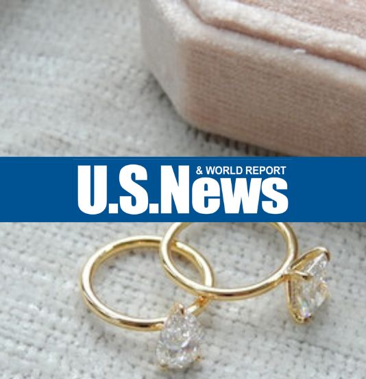 U.S. News & World Report logo bannered over two gold and diamond engagement rings