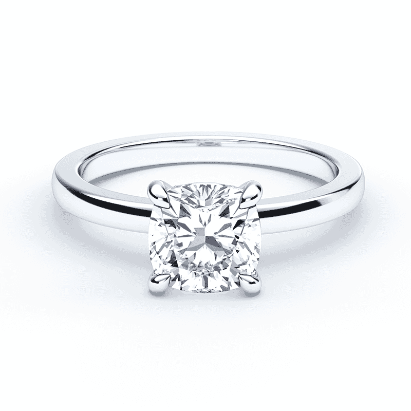 cushion cut diamond ring with a white gold band
