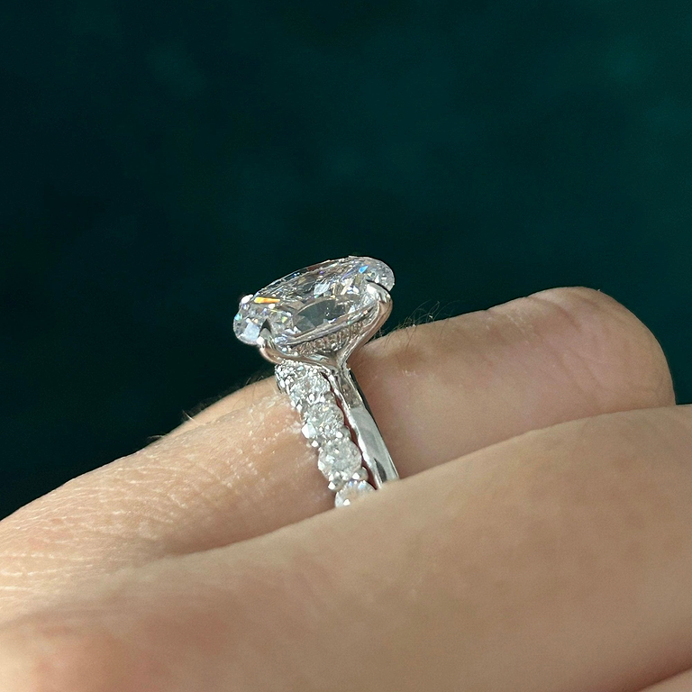 oval hidden halo engagement ring