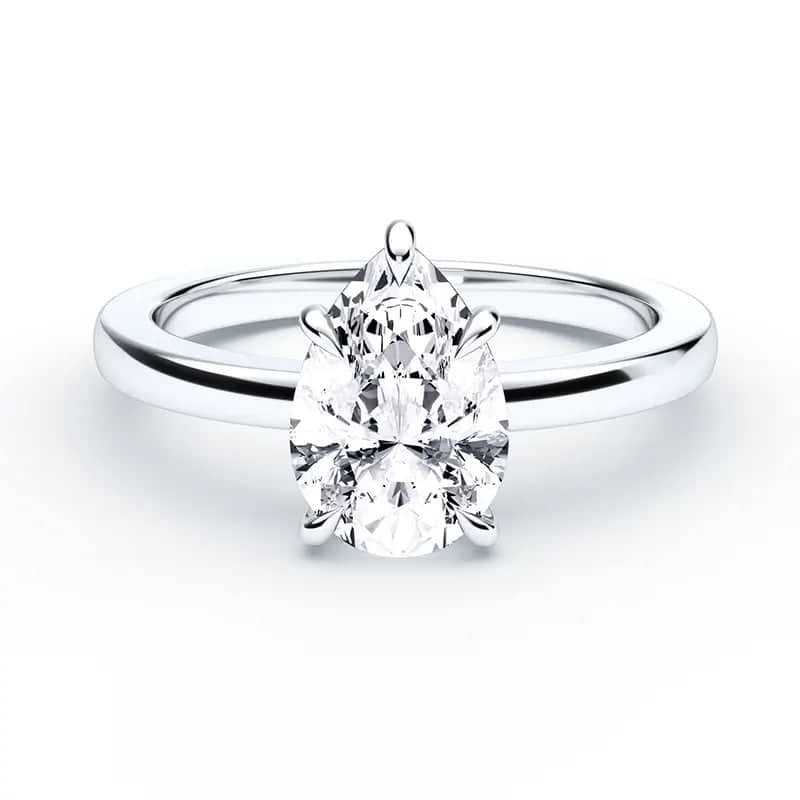 pear cut diamond solitaire on a solid white gold band