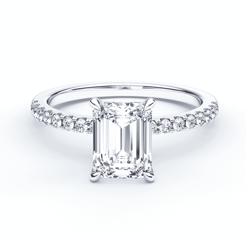 emerald cut diamond engagement ring with pave white gold band