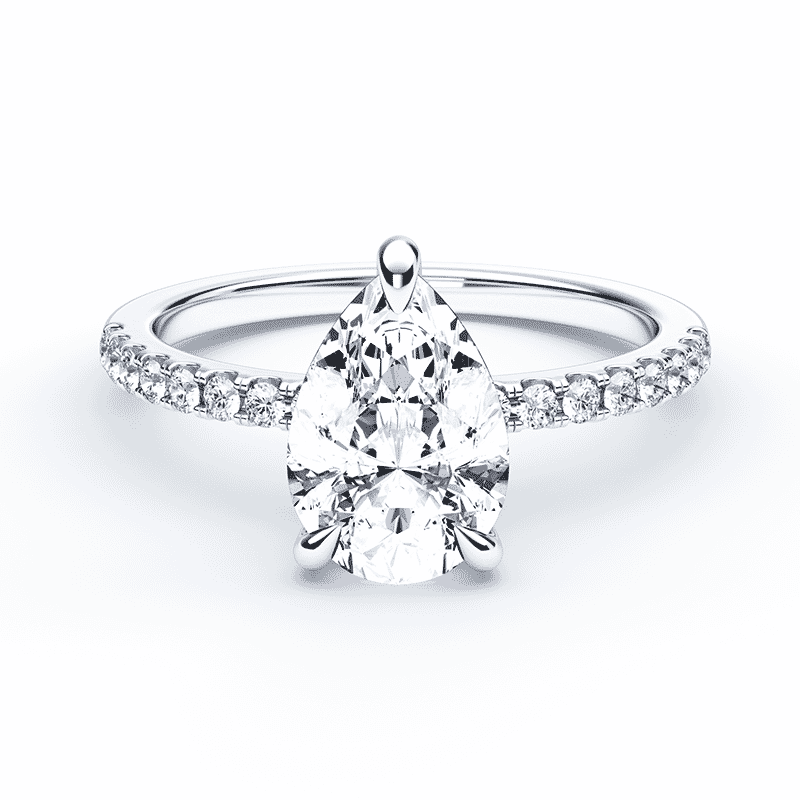 pear cut diamond ring with hidden halo on a white gold pave band