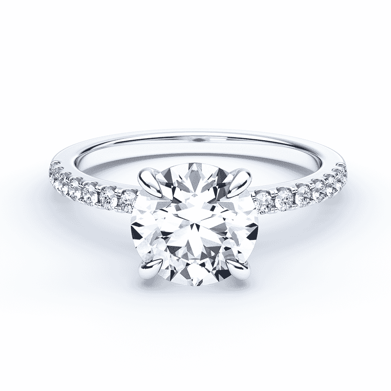 round cut diamond solitaire on a solid white gold pave band