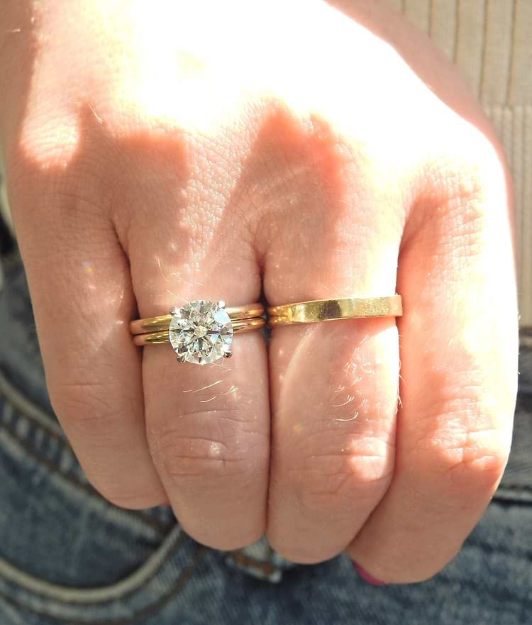 Round diamond ring on hand