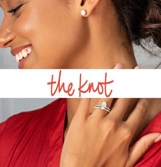 the knot logo bannered over a woman wearing a diamond wedding and engagement ring