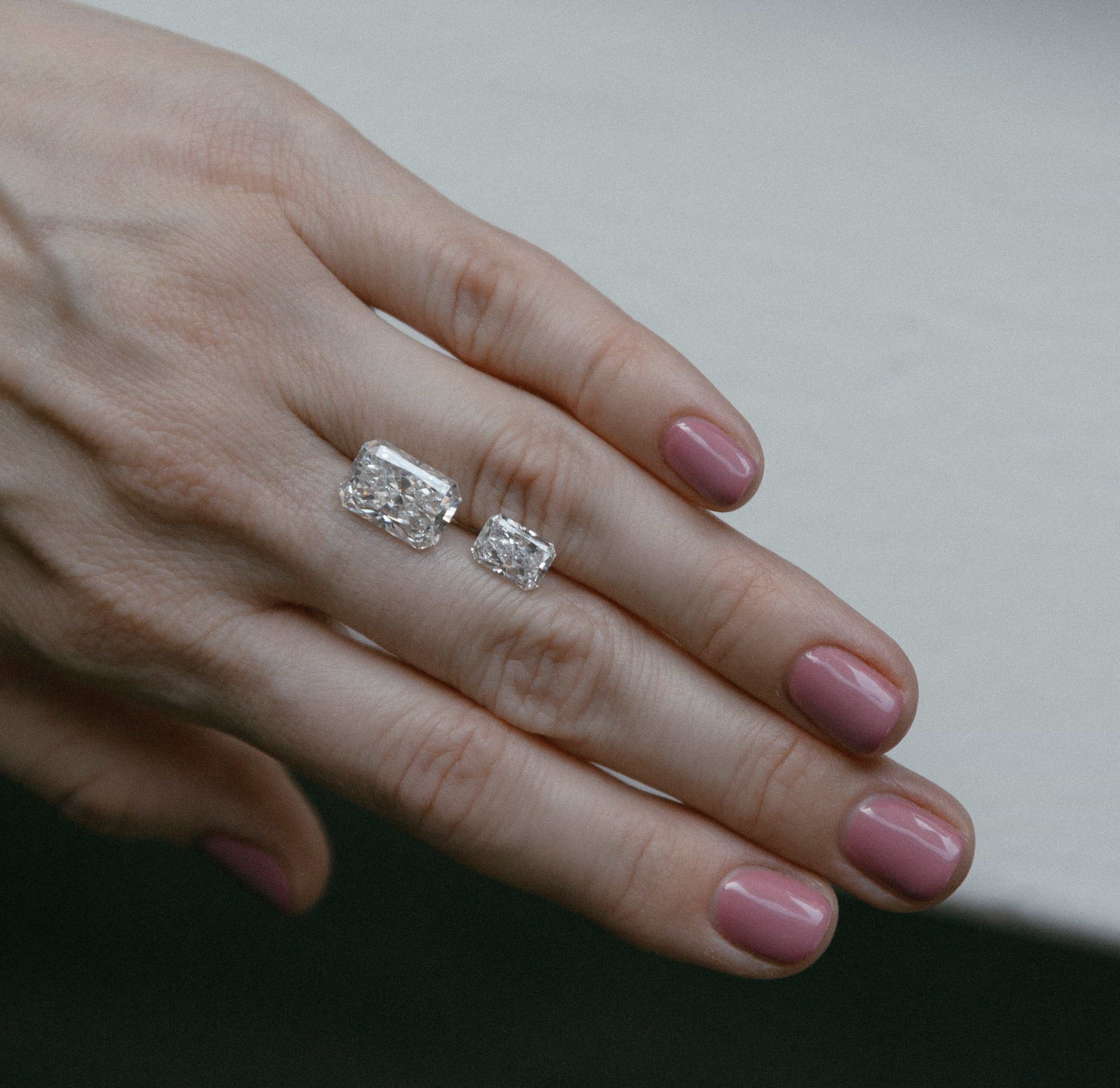 Two Radiant Cut Diamonds on a Hand