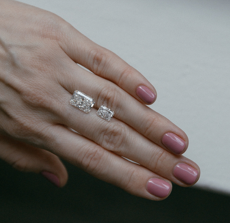 Two Radiant Cut Diamonds on a Hand