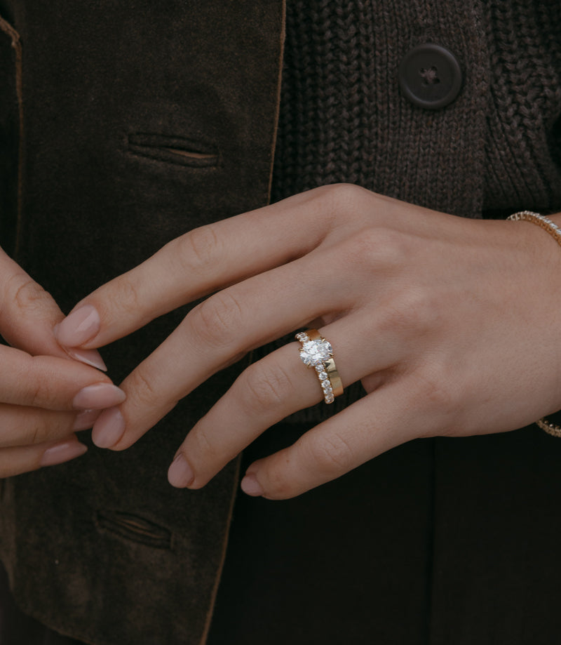 Oval Pave Diamond Ring with Wide Plain Wedding Band On Hand