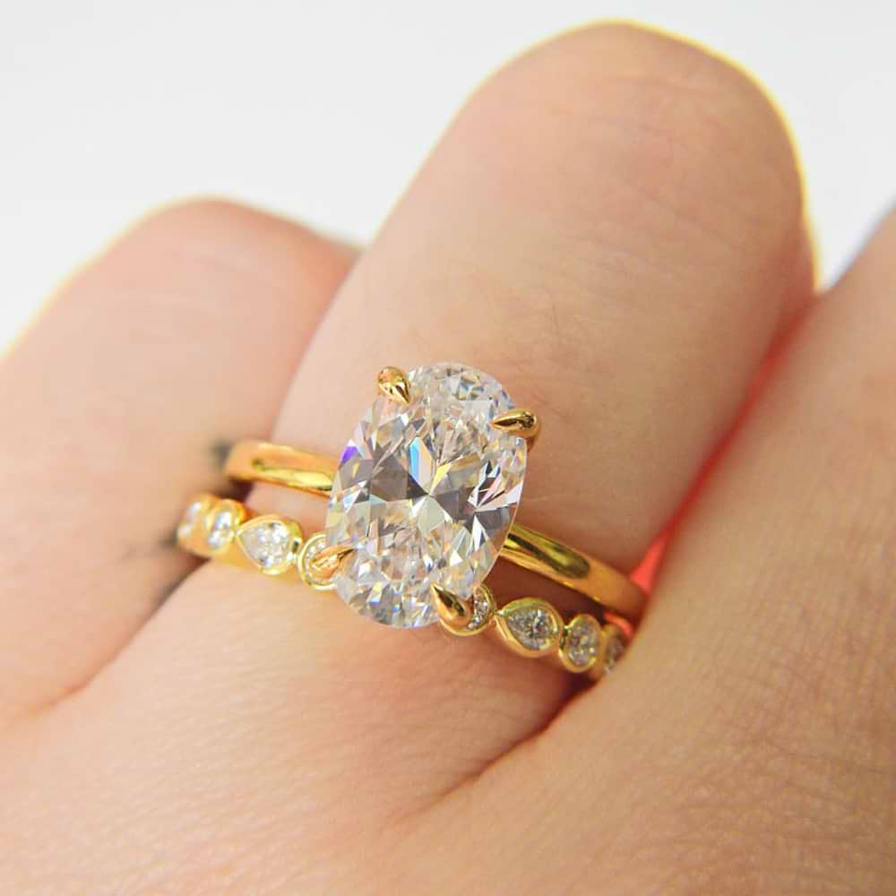 yellow gold oval diamond ring