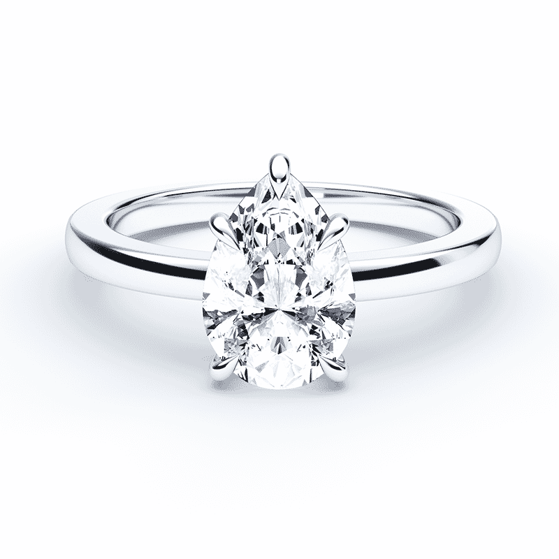 pear cut diamond solitaire on a solid white gold band