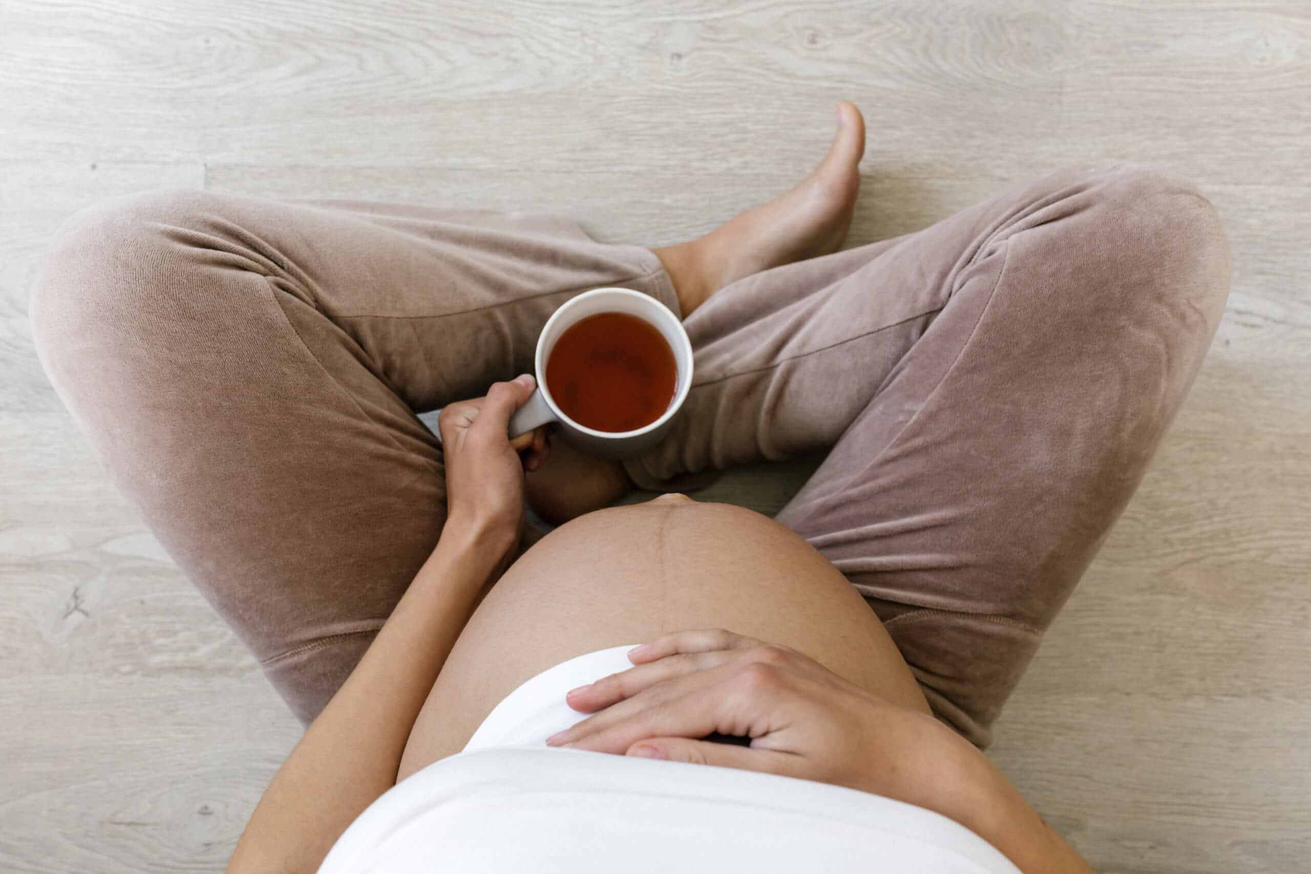 Pregnant Mom Drinking Raspberry Tea