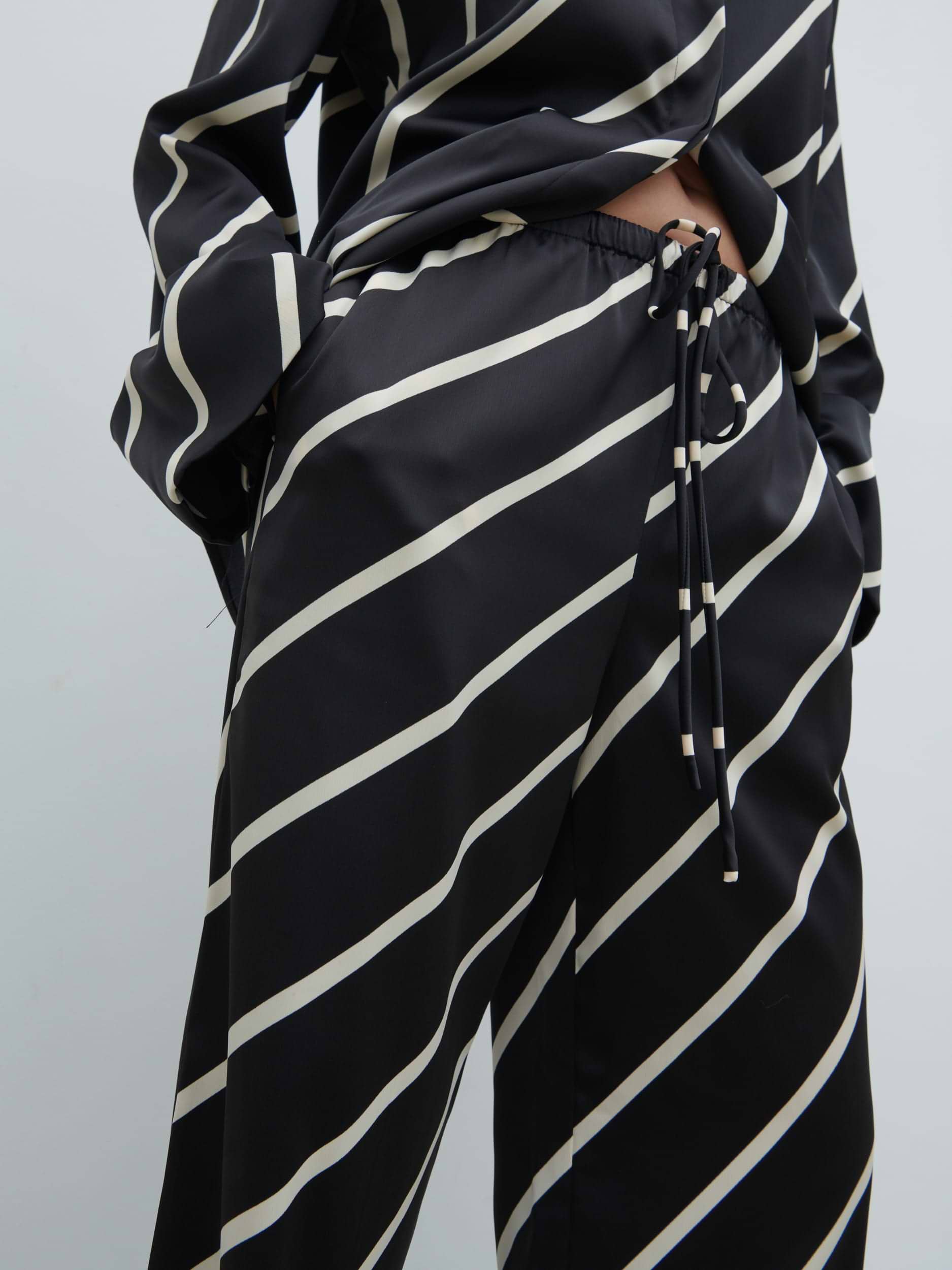Bobbi Drawstring Trousers - Black Asymmetric Stripe