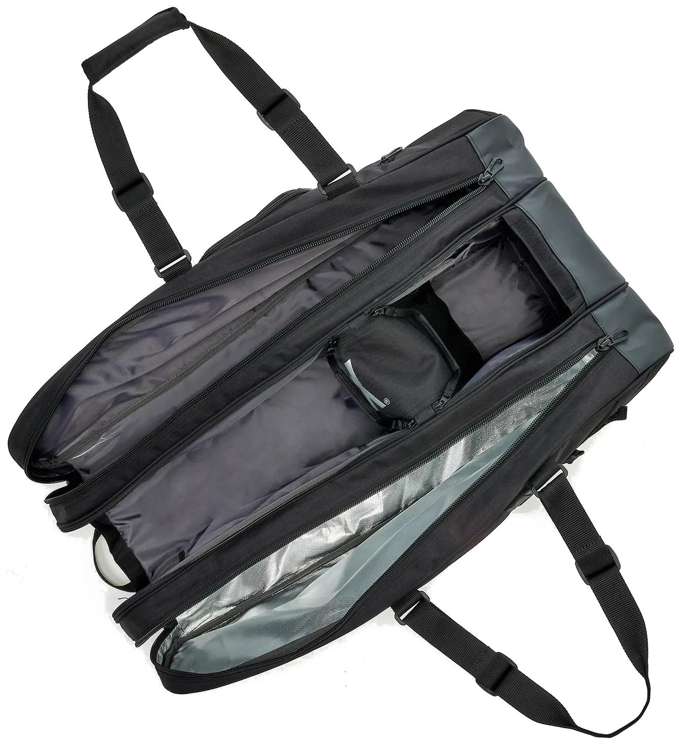 The Yonex BA72629EX Gearlogic 9 Racket Badminton Bag in black is displayed open, showing its spacious interior with a small zippered pouch, two handles, and an adjustable shoulder strap.