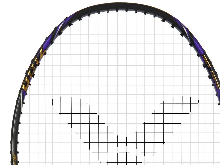 Close-up of the top half of the Victor Auraspeed 7100 4U Badminton Racket by Victor, showing its black and purple frame with white strings arranged in a V-shaped pattern.