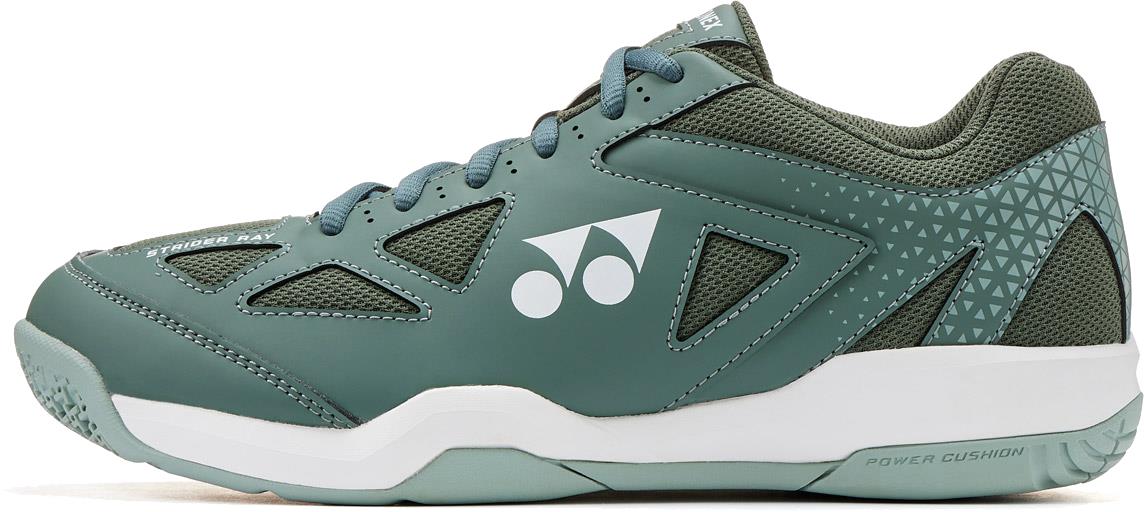 The Yonex Strider Ray WIDE Unisex Badminton Shoes in khaki feature a white Yonex logo, mesh panels, geometric heel designs, and a white Power Cushion sole. Wide fit for comfort and support in court sports.