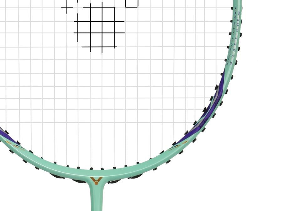 Close-up of the upper half of the Victor Auraspeed 7100 4U Badminton Racket by Victor in teal, made with high resilience graphite and featuring black strings and accents against a white background. Only part of the frame is visible.