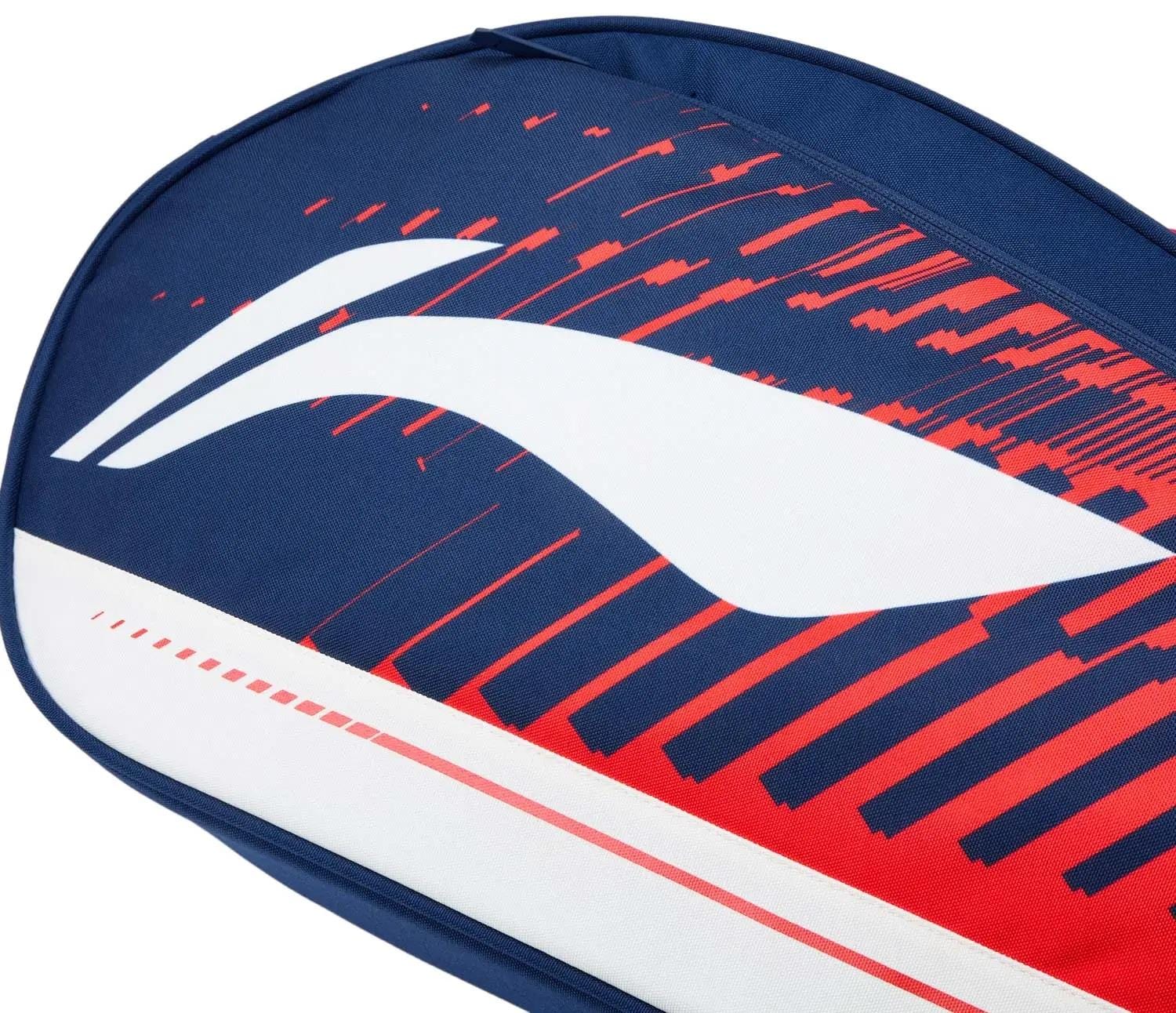 The Li-Ning Training Series 3 Racket Badminton Bag in blue and red features a dynamic abstract design, perfect for storing rackets.