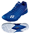 The Yonex Power Cushion Aerus Z2 Women's Badminton Shoes in Navy Blue are designed for agility, featuring a sleek design with the Power Cushion logo and a textured white sole with detailed tread for optimal grip, ideal for quick maneuvers on the court.