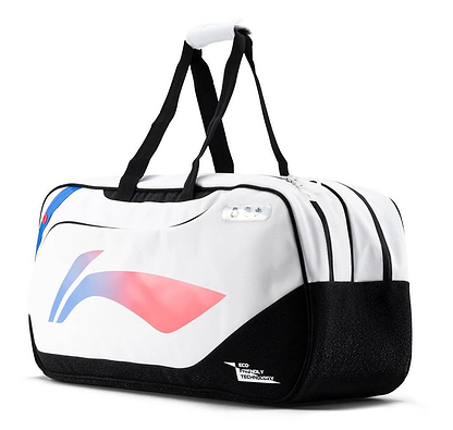 The Li-Ning Competition 6 Racket Badminton Bag in white and black features black handles, blue and pink accents, multiple zippered compartments, an "Eco Friendly Technology" label, and a plain white background.