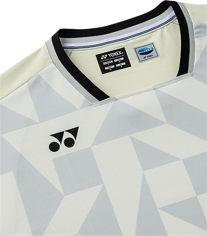 Close-up of the Yonex 10712YX Crew Neck Men's Badminton T-Shirt in Champagne, featuring geometric patterns, Yonex logo on the chest, and a black-trimmed collar—ideal quick-drying sportswear for top performance.