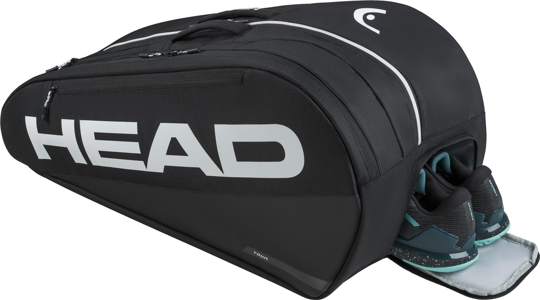 The HEAD Tour 9 Racket Badminton Bag L - Black by HEAD features multiple compartments with CCT+ climate control, white accents and logo, and is shown holding a pair of black and teal athletic shoes.