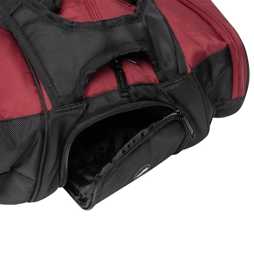 The Dunlop CX Performance 12 Badminton Racket Bag in black and red features ergonomic shoulder straps and showcases a small zippered side pocket. Its durable material with a textured finish makes it perfect for neatly storing badminton rackets.