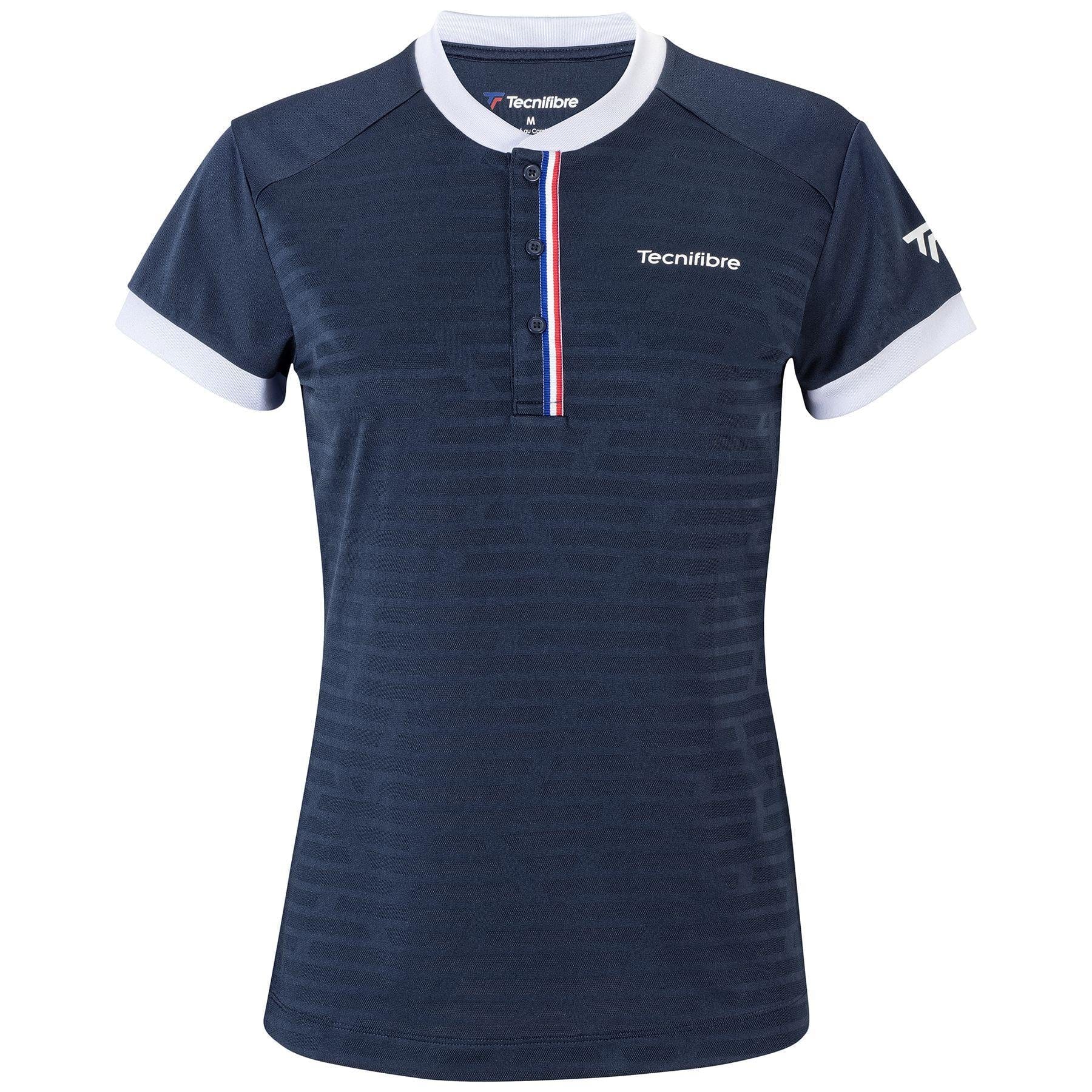 This Tecnifibre Women's F3 Polo Shirt, crafted from performance polyester, is presented in marine blue with white accents on the sleeves and collar. A button-up front is highlighted with striking tricolour detailing of red, white, and blue stripes, and the iconic Tecnifibre logo can be found adorning both the chest and sleeve.