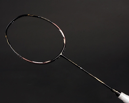 Featuring a sophisticated design in black with metallic gold details, the Victor Thruster FC Hendra Setiawan LTD Edition 3U Badminton Racket reflects Hendra Setiawan's signature style against a dark backdrop.