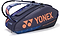 The Yonex 92429EX 9 Racket Pro Badminton Bag in Midnight Navy features purple and orange accents, the Yonex logo, "pro performance" text, Thermo Guard lining, a handle, and adjustable shoulder strap—ideal for pro players.