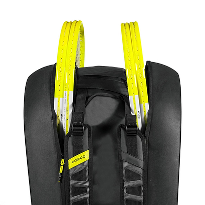 The Tecnifibre Reform L Badminton Racket Bag - Black by Tecnifibre is a spacious, durable EVA bag shown with two neon yellow racquet handles sticking out of the open compartment, displayed against a white background.